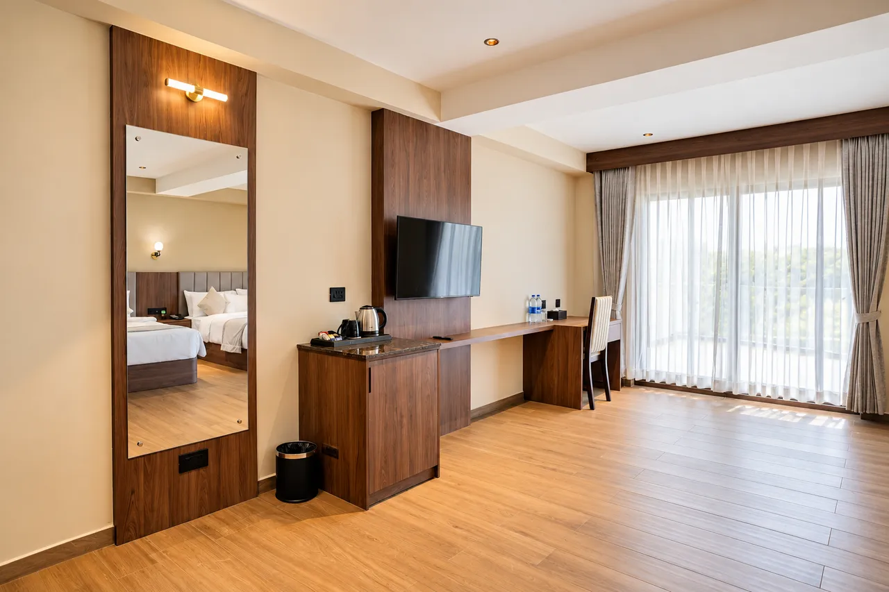 Family Suite Room interior photo 4 at Hotel Pumerai Honnavar
