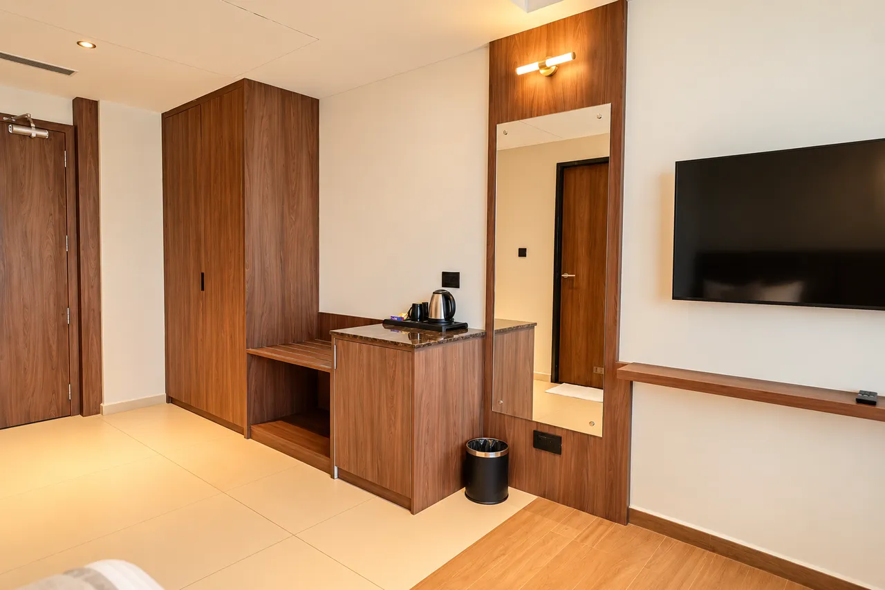 Premium Twin Room interior photo 2 at Hotel Pumerai Honnavar